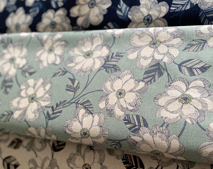 Magnolias , subtle navy colors on a pale duck egg blue background Japanese Linen/Cotton - fabric by the 1/4mtr