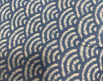 Waves on a  mid sky blue background