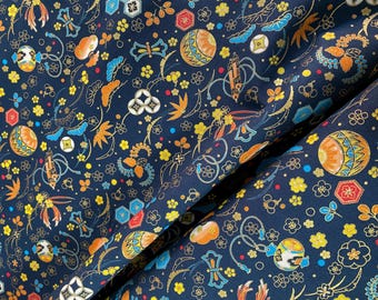 Símbolos sobre fondo azul. Algodón japonés - tela por 1/4 de metro.