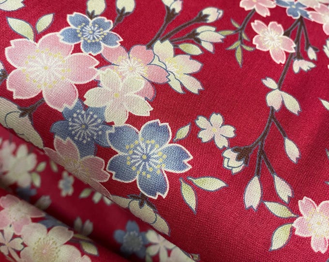 Cherry Blossoms on rich red fabric by the 1/4mtr