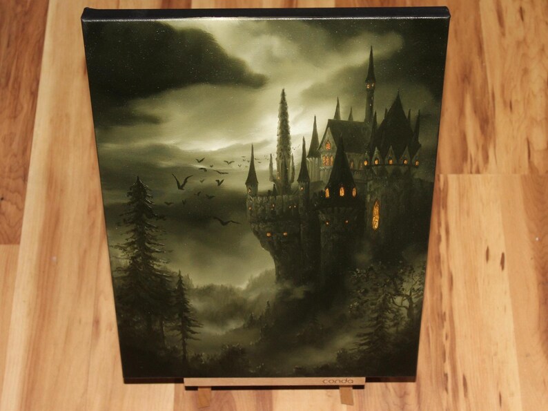 May include: A canvas print depicting a gothic castle on a cliff, under a cloudy sky. The artwork features a dark color palette with shades of gray and green, with birds flying in the sky. The castle has multiple spires and lit windows.