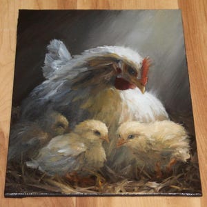 May include: An oil painting depicts a white hen with a red comb, sheltering three yellow chicks in a nest of straw. The artwork uses soft brushstrokes and warm lighting to create a cozy, pastoral scene.