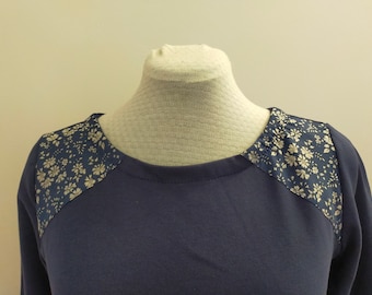 navy blue and liberty sweatshirt with flowers on the shoulders