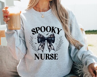 Halloween Nurse Sweatshirt - Cute Spooky Nurse T-Shirt - Halloween Gift for Nurse - ER Nurse Bow Shirt