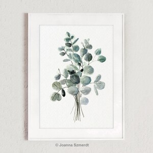 May include: A watercolor painting of a bouquet of eucalyptus leaves in shades of green and gray. The leaves are arranged in a loose, natural style, and the painting has a simple, elegant feel.