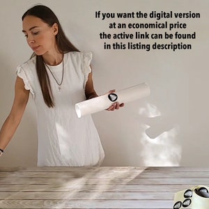 May include: A white rolled-up poster with a black tree logo. The text on the poster reads: "If you want the digital version at an economical price the active link can be found in this listing description."