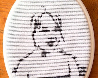 Embroidered framed portret