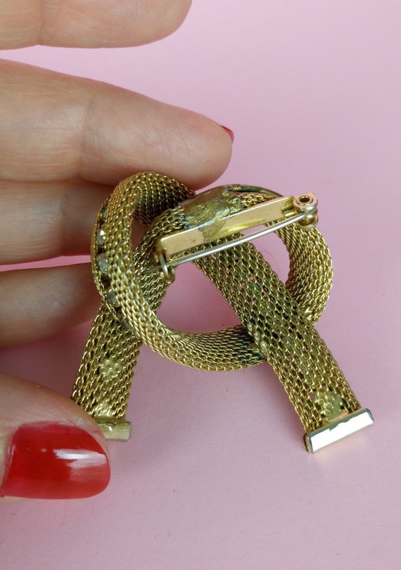 Vintage 50s Gold Tone Rhinestone Knot Brooch - Etsy Gold Knot Brooch with Rhinestones main image 0
