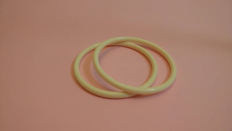 Vintage cream lucite bangles stackable set of two spacers bracelets 1960s