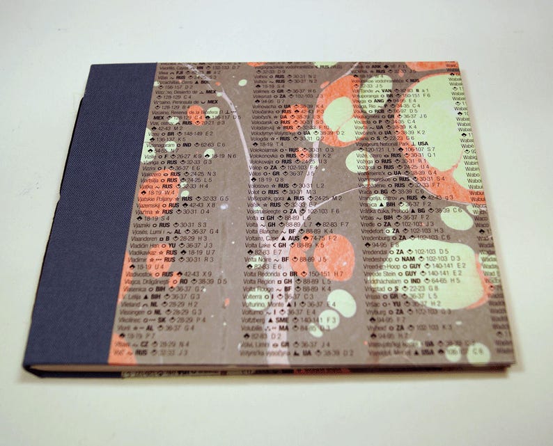 Small hand-bound notebook with marbled cover