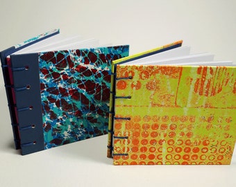 2 small pocket notebooks with gelly prints