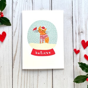 Carte de Noël chat, carte de Noël pour amoureux des chats, carte de joyeux Noël, carte de chat orange, carte de chat gingembre, boule à neige