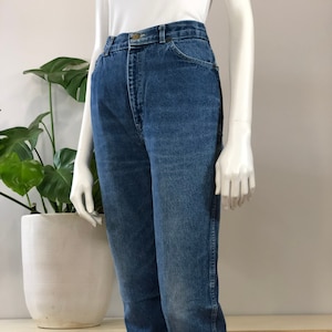 vintage taps toelopende en kortere klassieke stonewashed spijkerbroek jaren 80