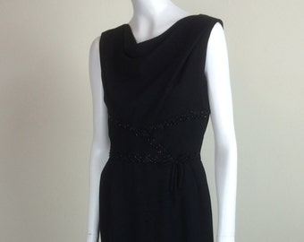 vintage black crepe wiggle dress w/ draped neckline & beaded trim 60s