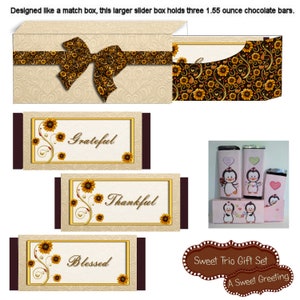 May include: A gift set featuring a large, beige slider box with a floral bow, and three chocolate bar wrappers with the words "Grateful", "Thankful", and "Blessed". Also included are penguin-themed chocolate bar wrappers.