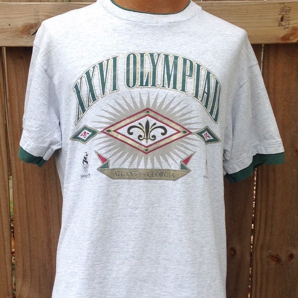 Vintage 1992 Large Atlanta, Georgia "XXVI OLYMPIAD" commemorative souvenir t-shirt. Hanes brand shirt, 100% cotton, Made in USA. Gray shirt