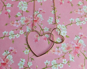 Collier double coeur acier inoxydable doré