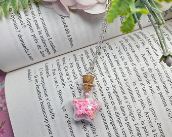 Collier fiole étoile remplie de petites étoiles roses