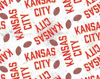 Chiefs Kansas City Football Toss - by Paintbrush Fabrics.  (Sold by 1/2 yd)