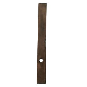 May include: A long, rectangular piece of wood with a dark brown finish. It has a circular hole near the bottom and a few smaller holes along its length. The wood appears to be aged or weathered.