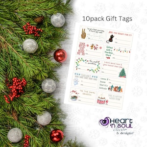 May include: Ten Christmas gift tags with various holiday-themed illustrations and text. The tags are printed on white paper and feature designs such as a snowman, a Christmas tree, a reindeer, and a Santa Claus. The text on the tags includes phrases like "This night is sparkling", "Gifted with a fearless heart", and "Tis the damn season".