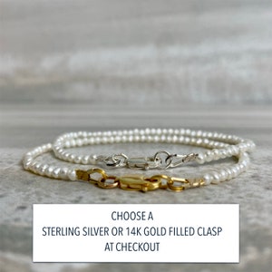 May include: A white pearl necklace with a sterling silver or 14k gold filled clasp. CHOOSE A STERLING SILVER OR 14K GOLD FILLED CLASP AT CHECKOUT.