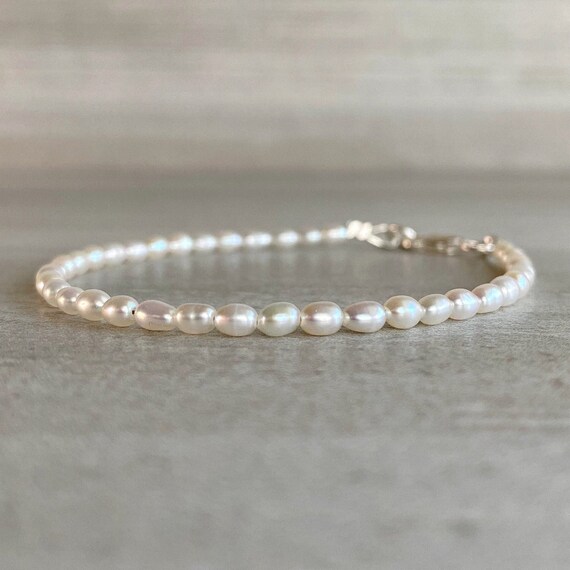 Small White Cultured Freshwater Pearl Strand Sterling Silver Bracelet Adjustable Length Small White Cultured Freshwater Pearl Strand Sterling Silver Bracelet Adjustable Length