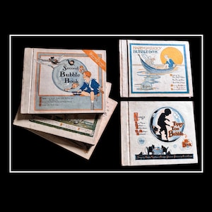 May include: Four vintage children's books with colorful covers. The books are titled "Second Bubble Book", "Happy-Go-Lucky Bubble Book", "Songs of Mother Goose", and "Tippy Toe Bubble Book".