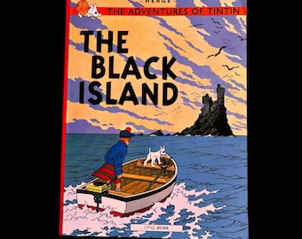 The Adventures of Tintin The Black Island by Hergé. Stated First American Edition April 1975. Softcover.