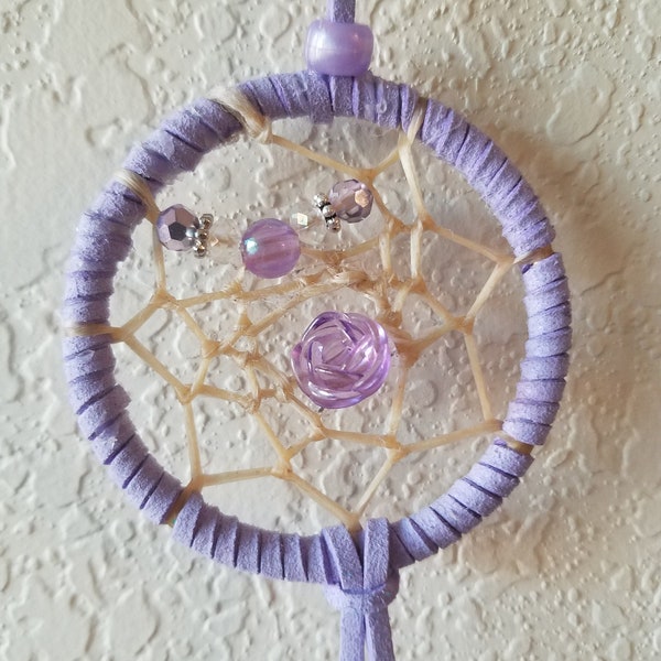 4030 - Dreamcatcher Key Ring - Lilac Leather Wrapped Ring With Purple and Crystal Beads and a Light Purple Flower on the webbing