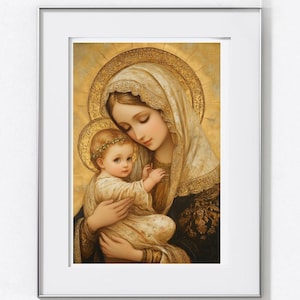May include: A framed religious print showing a woman and child in a tender embrace. The woman, wearing a white veil and gold halo, holds the child. The artwork uses a warm colour palette with gold, cream, and black accents, creating a serene and classic aesthetic.