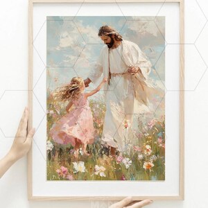 May include: A framed art print depicting a figure in white robes with a crown of thorns, extending a hand to a young girl in a pink dress. The scene is set in a field of wildflowers, with a soft, painterly style.