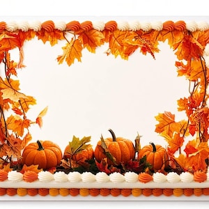 May include: A rectangular sheet cake with a white frosting surface, bordered by alternating orange and white piped frosting shells. The top features a printed design of vibrant orange and yellow autumn maple leaves and four orange pumpkins.