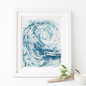 Striking blue wave artwork, a must-have statement piece for bathrooms, perfect as a housewarming or holiday gift.Rolling blue wave painting, a captivating wall art gift for anniversaries, adding elegance to modern interiors.