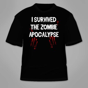 I Survived The Zombie Apocalypse T-Shirt. Funny Zombies Outbreak Response Team T Shirt Halloween Costume Gag Gift Novelty Blood Brains Tee