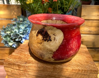 Hand turned bowl/vessel from white oak with dark orange resin.