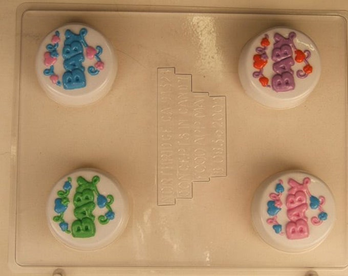 BABY with scattered hearts and swirls B083