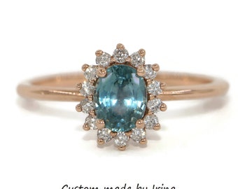 Ocean Blue Oval Montana Sapphire Engagement Ring with Diamond Halo