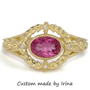 May include: A gold ring with an oval pink gemstone, surrounded by a floral and leaf pattern. Tiny diamonds are set in the floral details. The text "Custom made by Irina" is at the bottom.