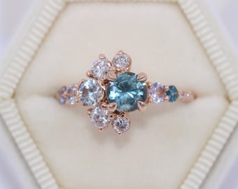 Sun and Moon Cluster Ombre Engagement Ring With Pastel 1 carat Teal Montana Sapphire