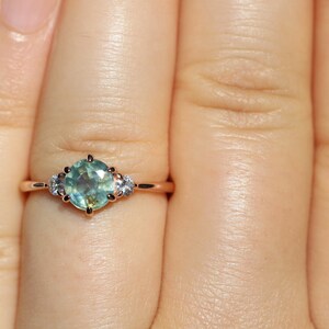 Oore jewelry. Nature inspired 3 stone engagement ring by Irina.