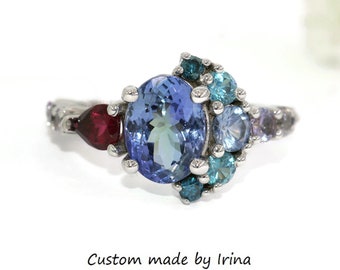 Custom-made Oval Tanzanite Ombre Cluster Crescent Halo Ring