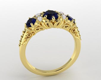 Scrolls Pattern Trilogy Oval Blue Natural Sapphires Ring with Pearl and Diamonds