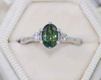 1.35 carat Oval Green Natural Sapphire Three Stone Ring