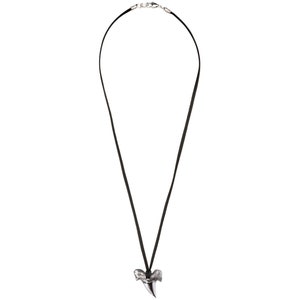 Poured silver shark's tooth pendant, suspended from a deerskin leather necklace with sterling silver findings.