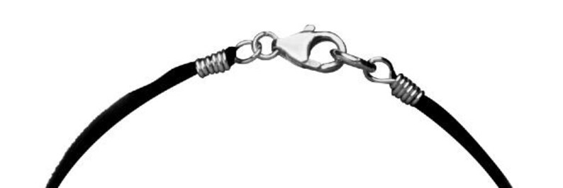 Close up of black deerskin leather necklace with sterling silver findings, wrapped in sterling silver wire. Silver findings include lobster clasp.