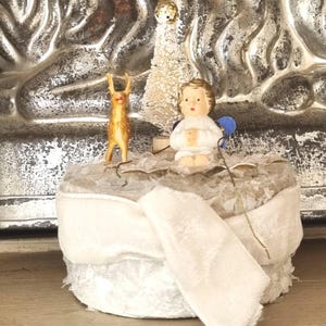 Vintage Christmas Angel Box Decoration with SNOW velvet ribbon and plastic deer sitting in front of Christmas Tree handmade.