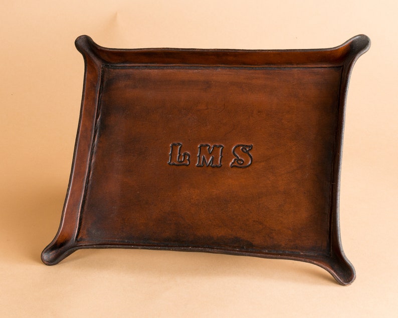 A tray finished in Brown.