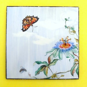 May include: A hand-painted ceramic tile featuring a blue passionflower with a yellow center, a brown and orange butterfly, and a small bee. The tile has a light blue background with white clouds.
