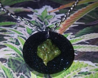 Real Cannabis flower with Black glitter background Pendant